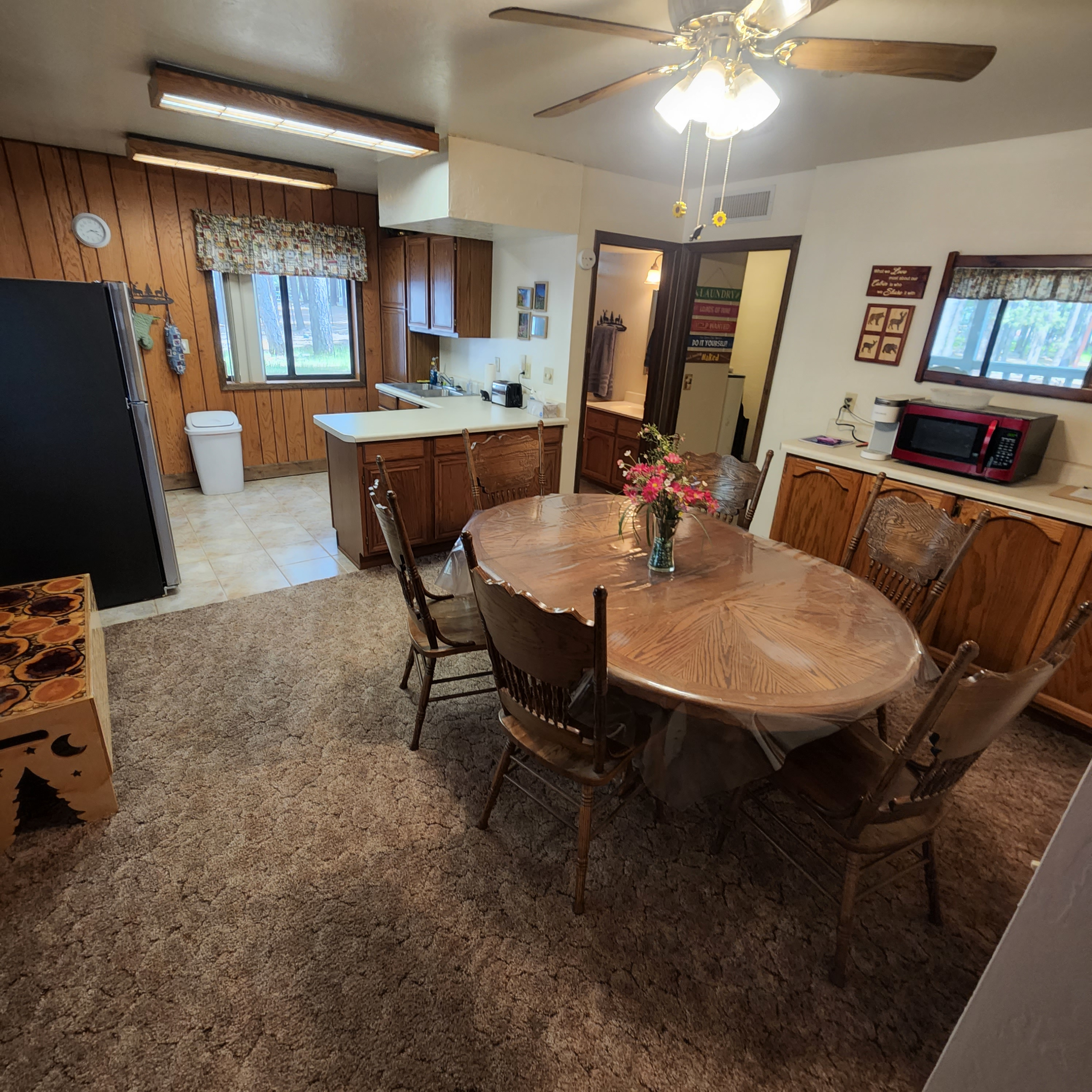 Dining Room and Kitchen - The dining room is set right off the kitchen with direct access to the bathroom, utility room and back yard areas.