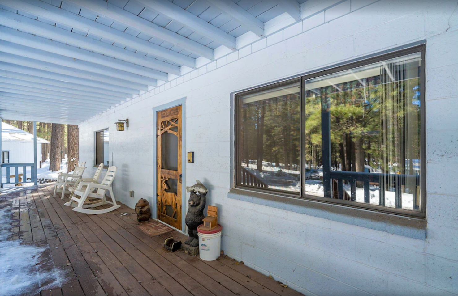 Cabin Front Porch - The front porch is the perfect place to sit, watch nature, smell the pines and just relax.