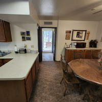 Another view showing the back yard access from the Dining and Kitchen areas.