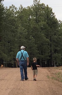 A nice walk down a Forest Lakes road with a grandson.